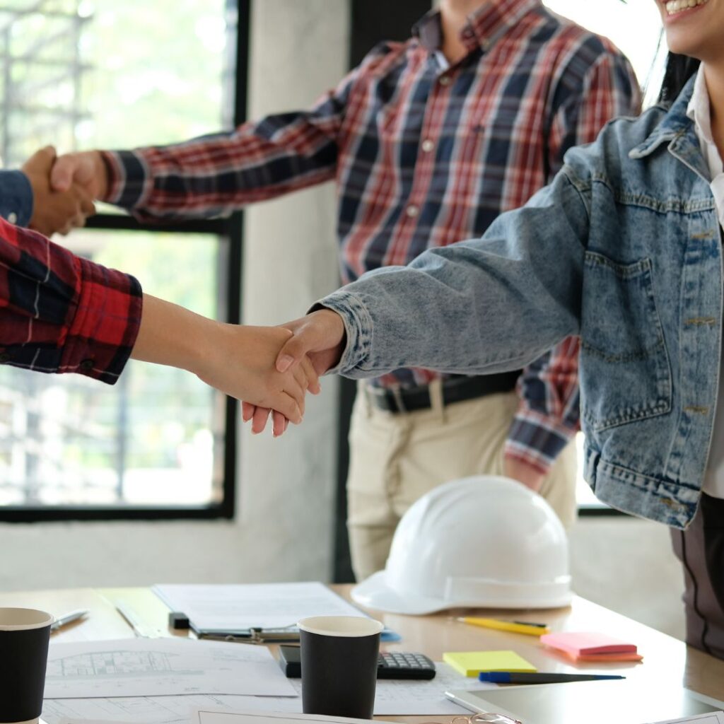 Shaking hands with contractor