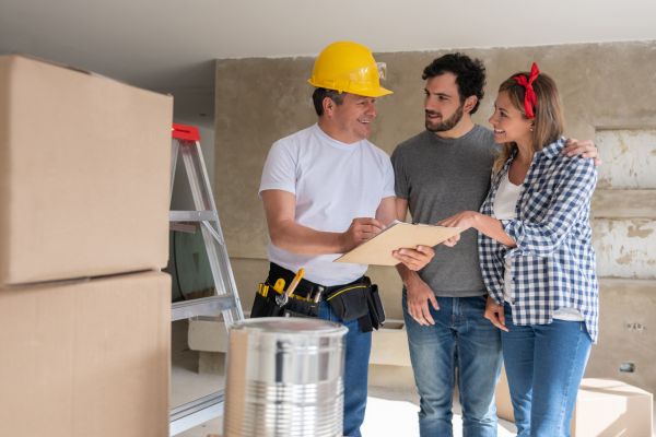 remodeling contractor talking with clients