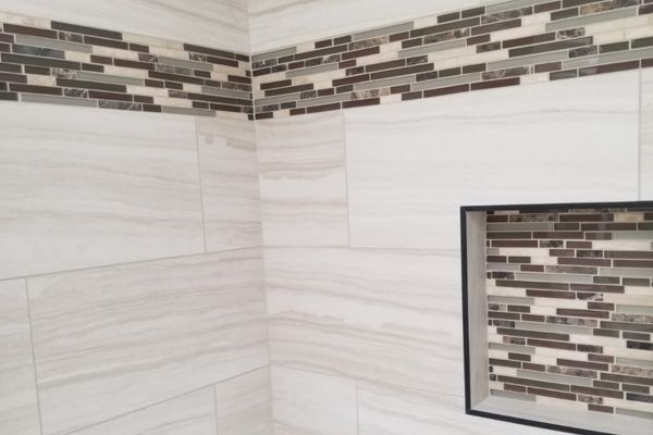 up close view of showering tiling